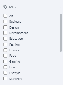 The TAGS panel inside the React News article editor — a checklist of tags (Art, Business, Design, Development, Education…) that tag the article